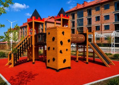 Castle-themed wooden playground — Elysee