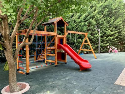 Swing and wooden play area — Elysee
